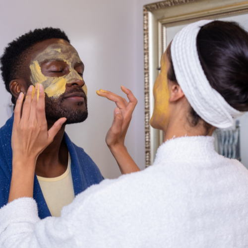 the essential facial boxey man woman couple applying facial mask together
