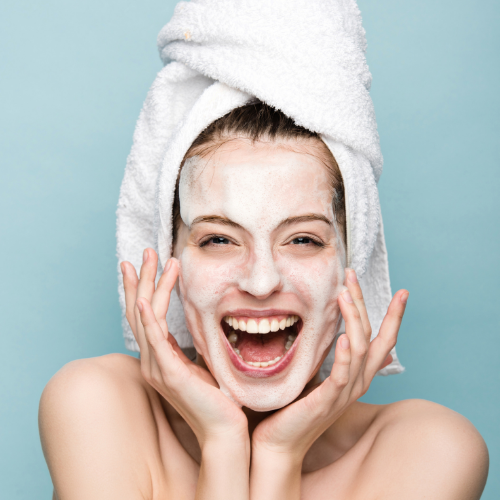 the calming facial boxey woman cleansing face