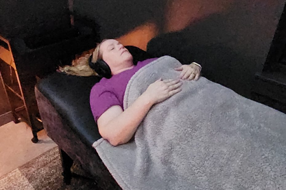 Woman on vibroacoustic therapy table