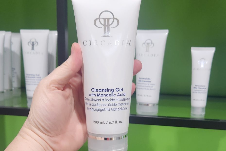 Windy Linde holding a tube of Circadia Cleansing Gel with Mandelic Acid at Linde Esthetics & Wellness Studio in Springfield MO