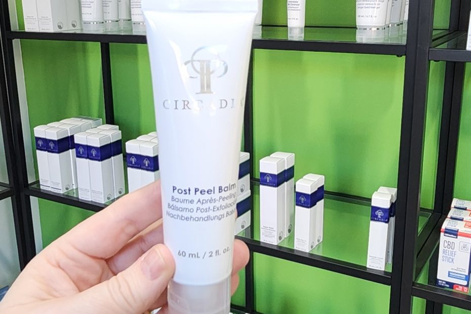 Windy Linde is holding a tube of Circadia Post Peel Balm at Linde Esthetics & Wellness Studio in Springfield, MO