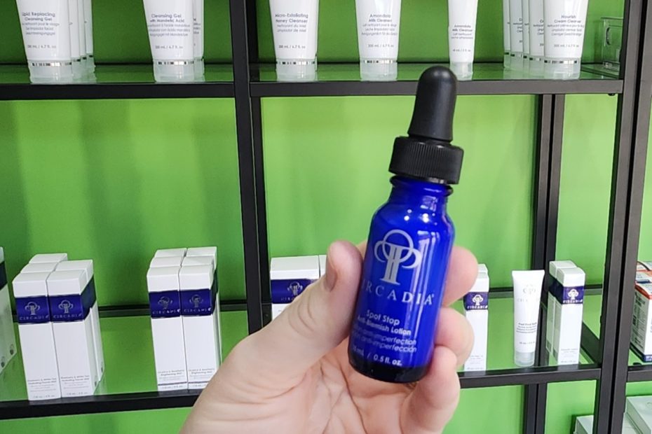 Windy Linde is holding a bottle of Circadia Spot Stop at Linde Esthetics & Wellness Studio in Springfield MO