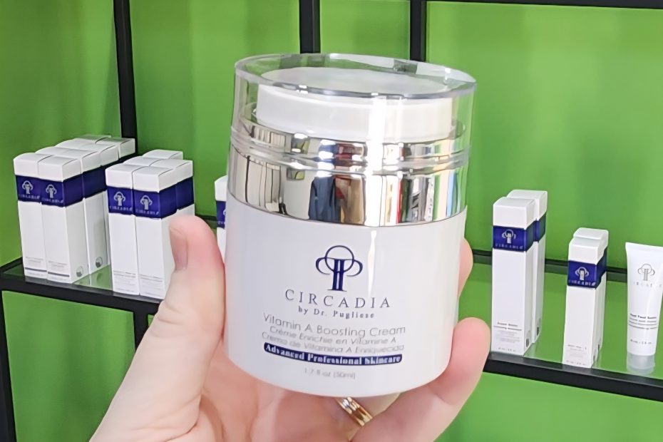 Windy Linde is holding a jar of Circadia Vitamin A Boosting Cream at Linde Esthetics & Wellness Studio in Springfield MO